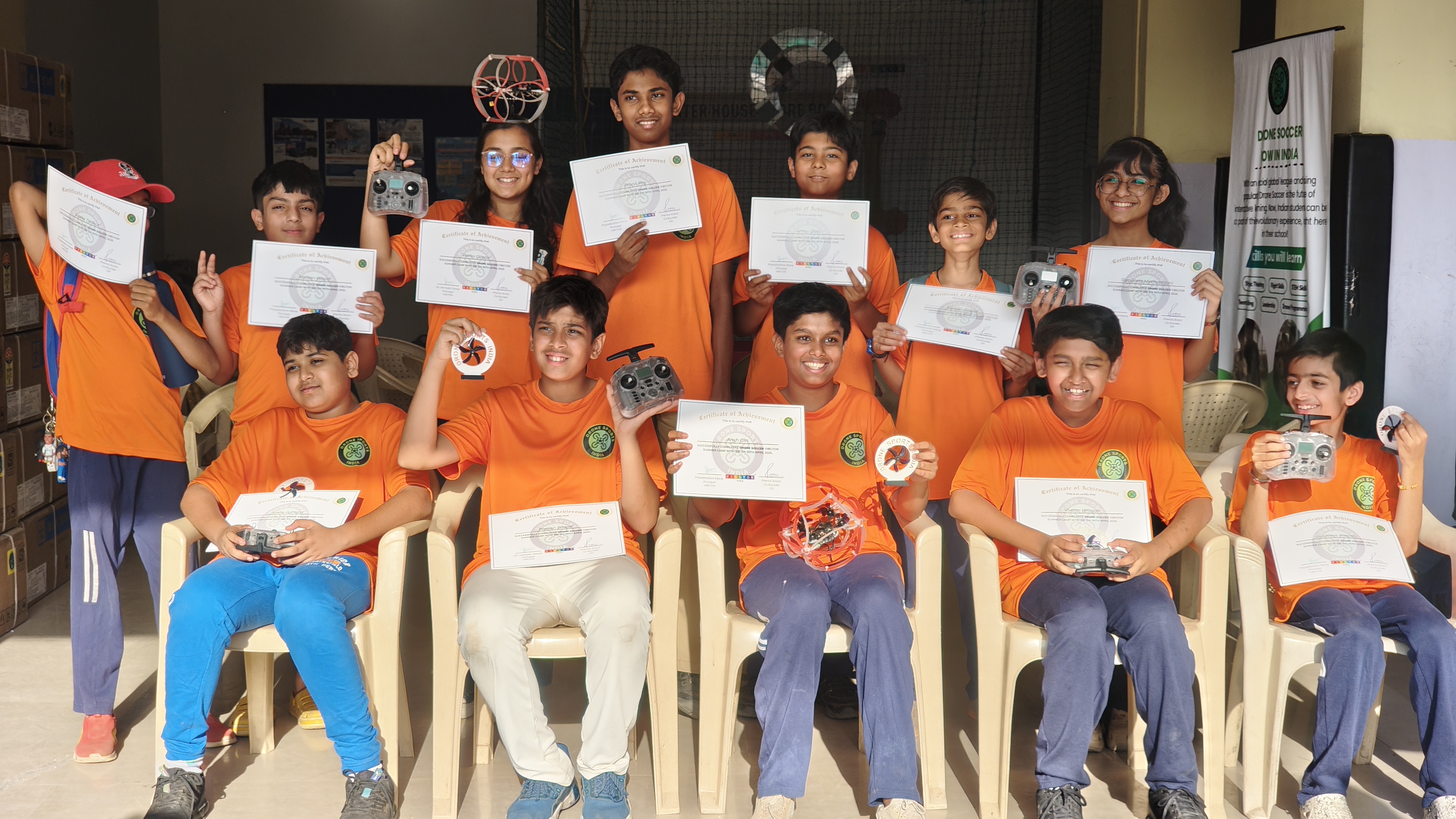 Group of students holding certificates